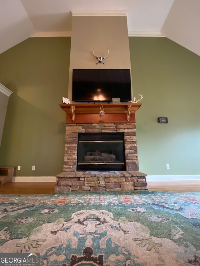 details featuring crown molding and a stone fireplace