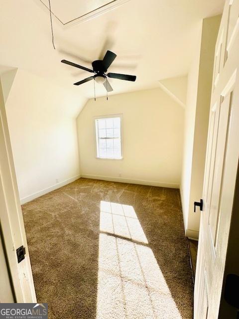 additional living space with carpet floors, lofted ceiling, and ceiling fan