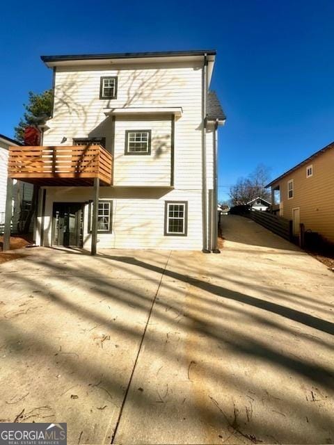 rear view of property with a patio area