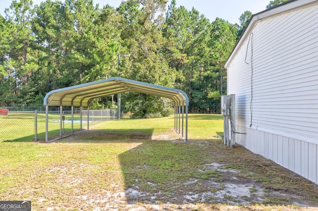 view of yard featuring a carport