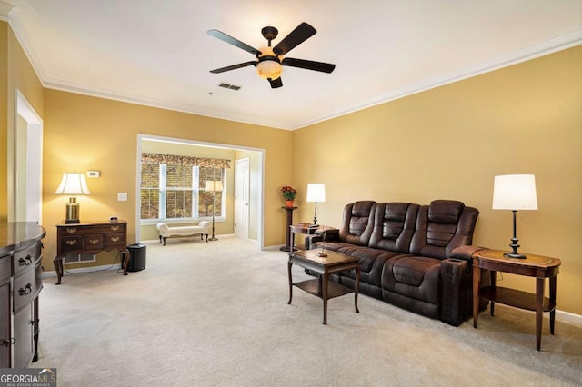 living room with light carpet, ceiling fan, and ornamental molding