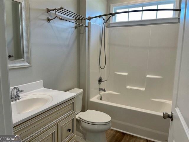 bathroom featuring hardwood / wood-style floors and vanity