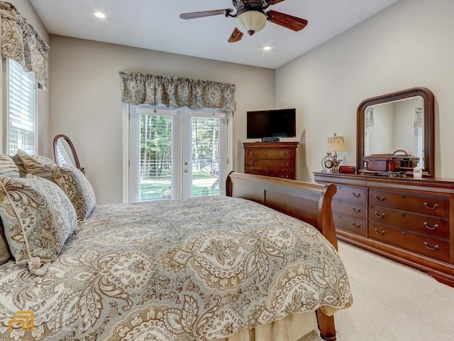 carpeted bedroom featuring ceiling fan and access to exterior