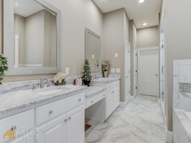 bathroom featuring vanity and shower with separate bathtub