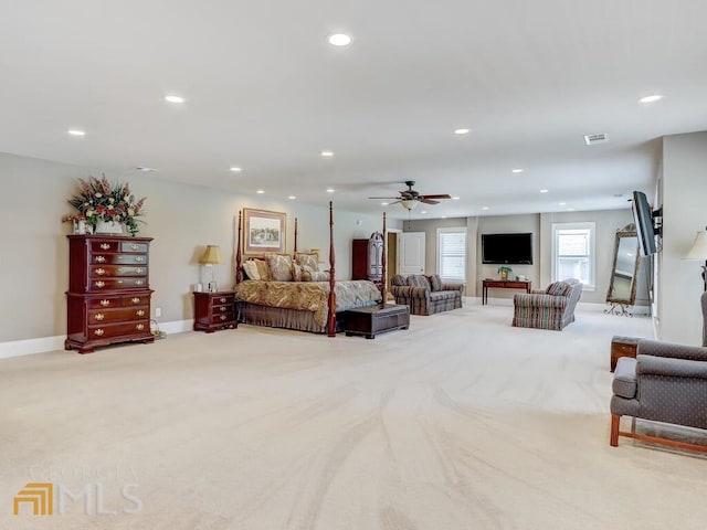 carpeted bedroom with ceiling fan