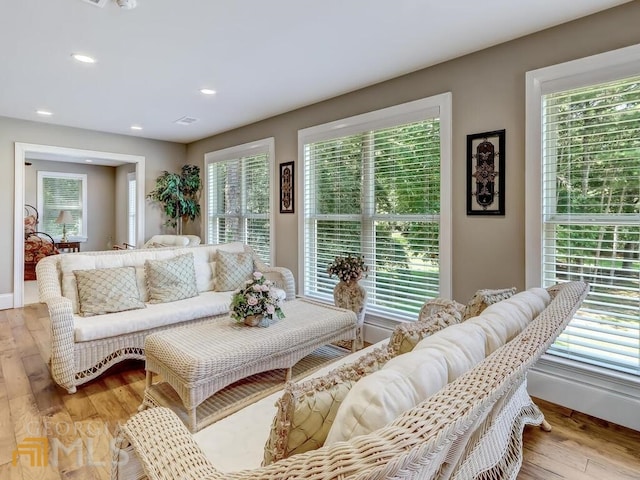 living room with light hardwood / wood-style floors