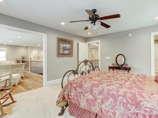 carpeted bedroom featuring ceiling fan and access to outside