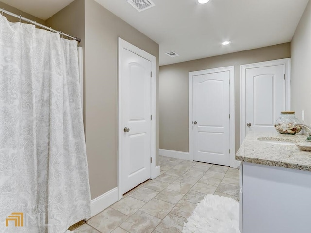 bathroom featuring vanity