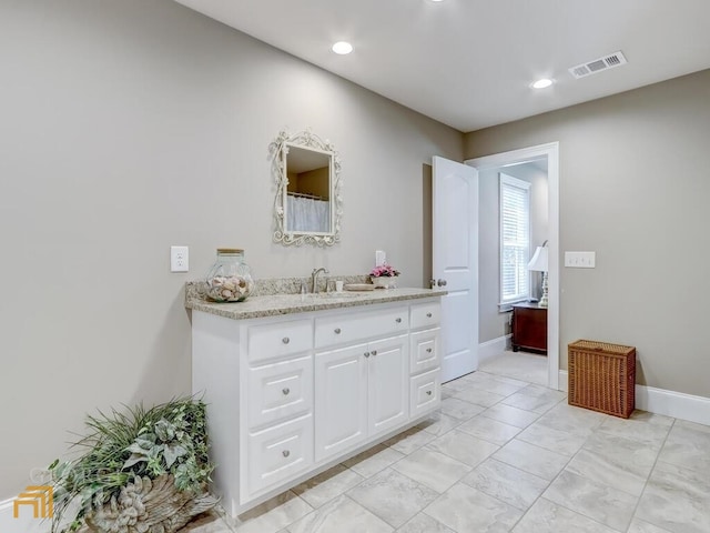 bathroom featuring vanity