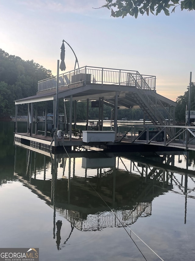 dock area with a water view