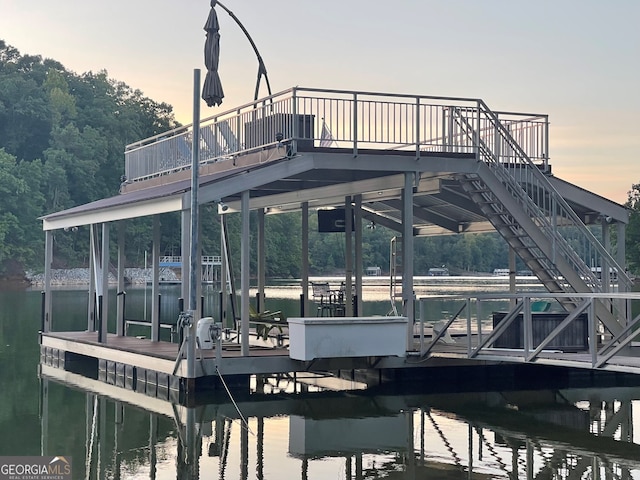 dock area with a water view