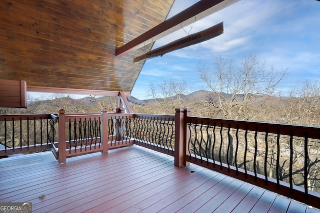 wooden terrace with a mountain view