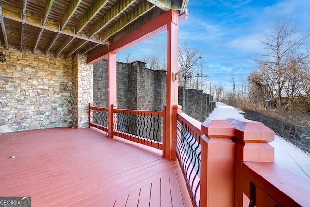 view of snow covered deck