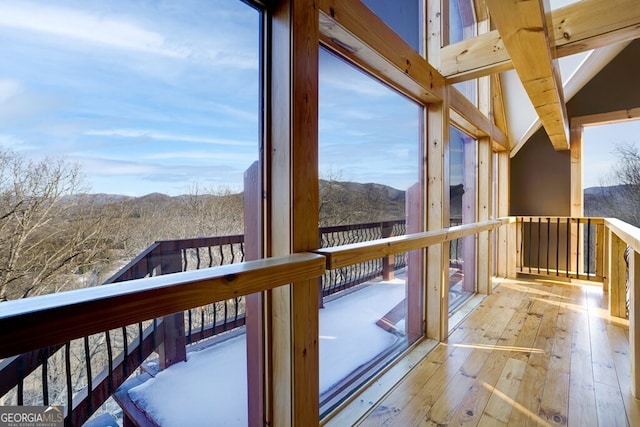 sunroom with a mountain view