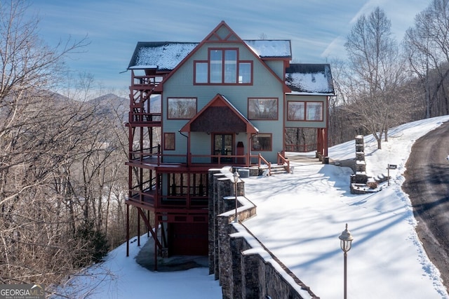 view of snow covered property