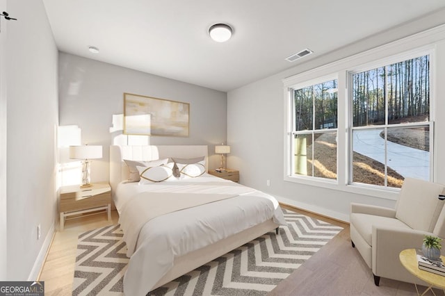 bedroom featuring light hardwood / wood-style floors