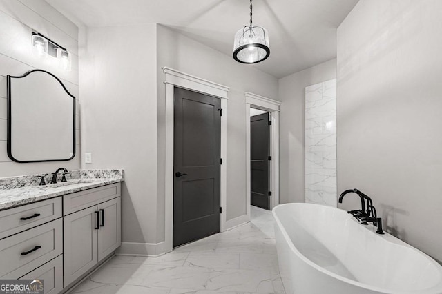 bathroom with vanity and a bathing tub