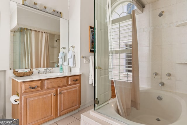 bathroom with shower / tub combo, tile patterned flooring, and vanity