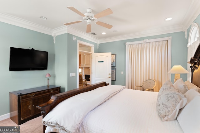 carpeted bedroom with ceiling fan and ornamental molding