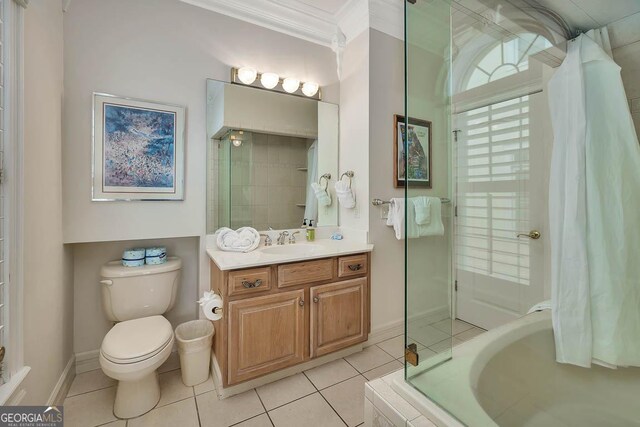 full bathroom featuring tile patterned floors, vanity, toilet, ornamental molding, and separate shower and tub