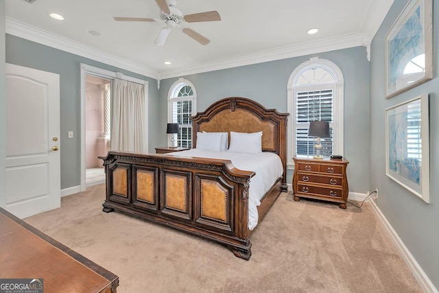 carpeted bedroom with ceiling fan and crown molding