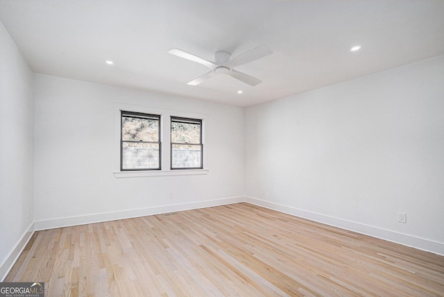 empty room featuring light hardwood / wood-style floors and ceiling fan