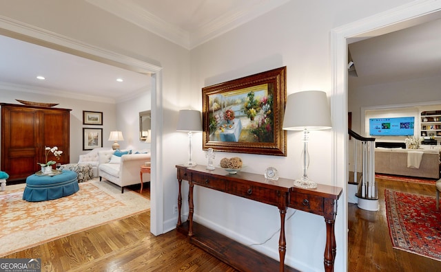 hallway featuring crown molding and dark hardwood / wood-style floors