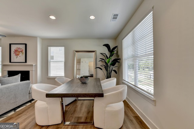 dining room with light hardwood / wood-style flooring