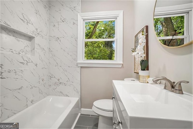 full bathroom featuring toilet, vanity, tile patterned flooring, and plenty of natural light