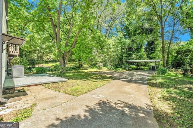 view of yard featuring central AC