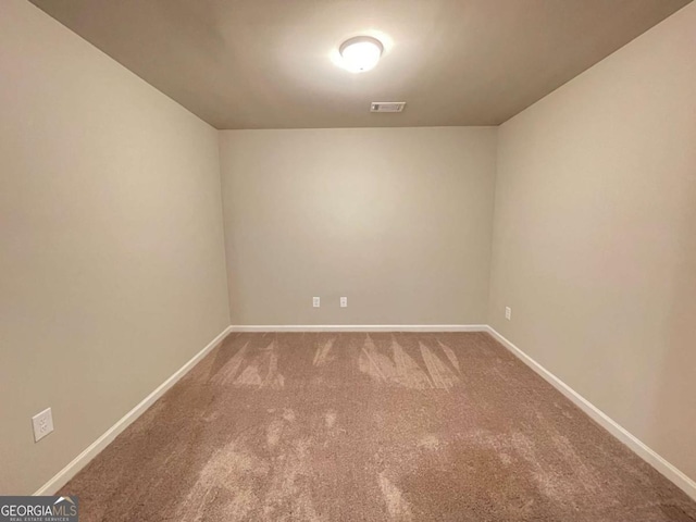 empty room with carpet floors