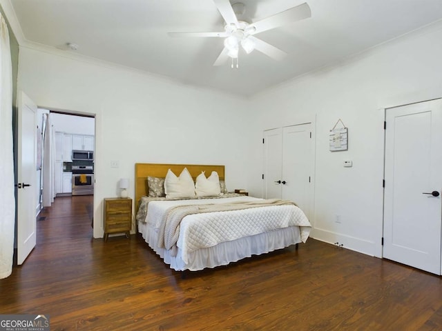 bedroom featuring ceiling fan, dark hardwood / wood-style flooring, and crown molding