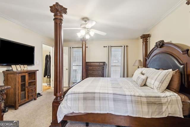 carpeted bedroom featuring ceiling fan and ornamental molding