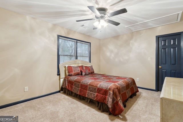 bedroom with ceiling fan and light carpet