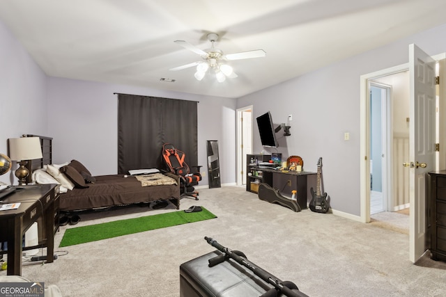 carpeted bedroom with ceiling fan