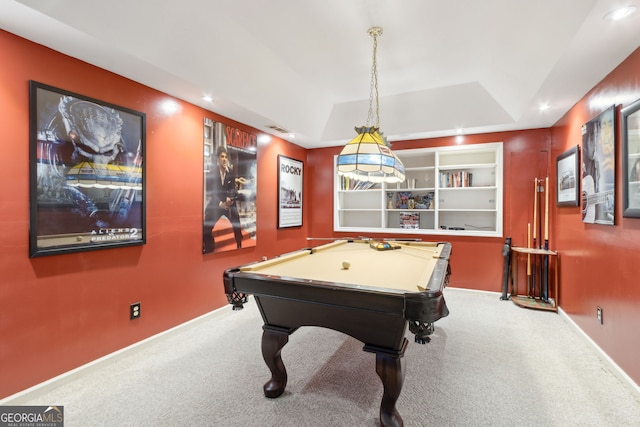 game room featuring a raised ceiling, built in shelves, carpet, and pool table