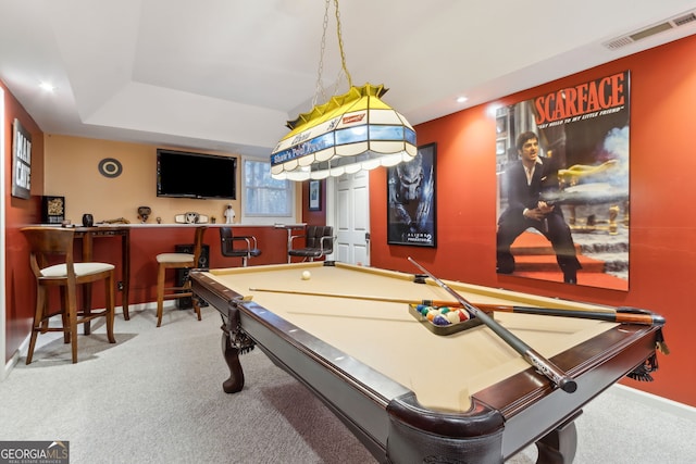 rec room with carpet floors, pool table, a raised ceiling, and bar