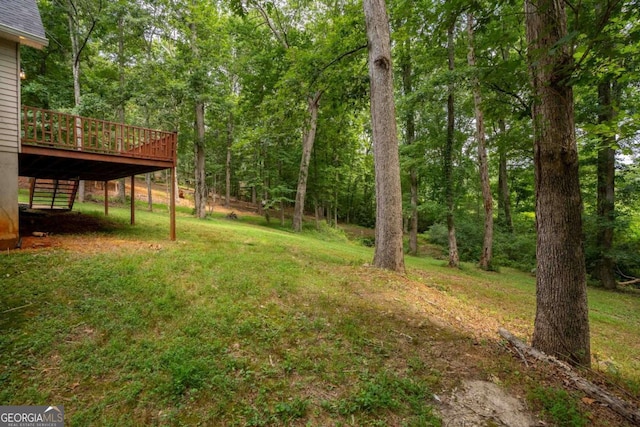 view of yard with a deck