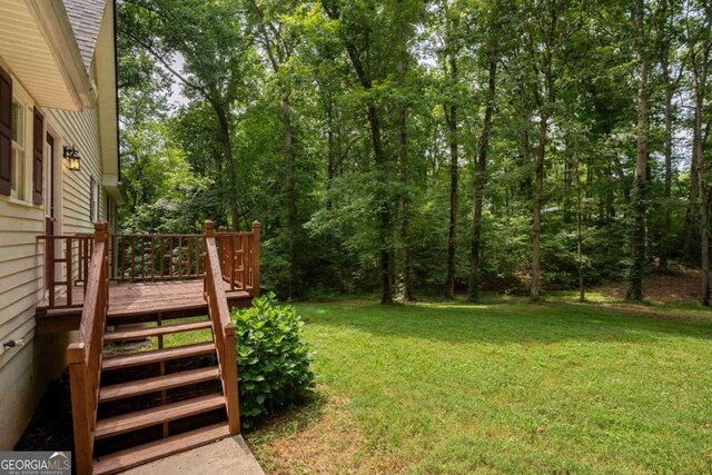 view of yard featuring a deck