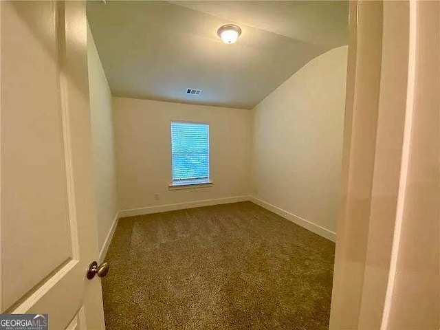 spare room with carpet flooring