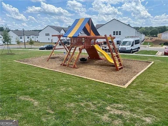 view of play area featuring a yard