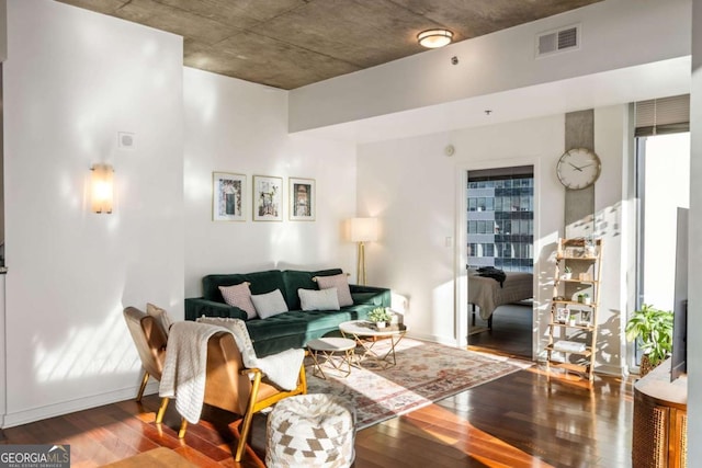 living room with hardwood / wood-style floors