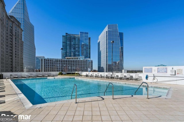 view of pool featuring a patio area