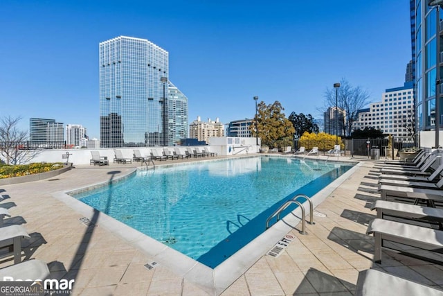 view of pool featuring a patio