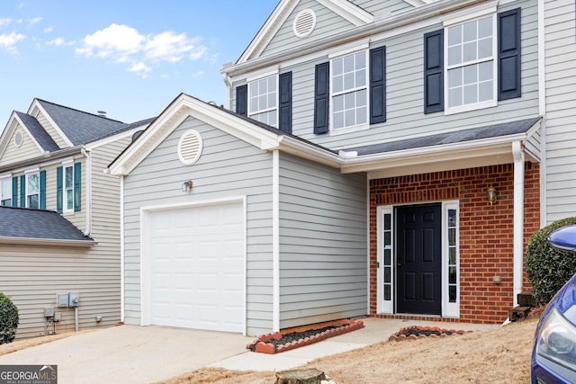 view of property with a garage