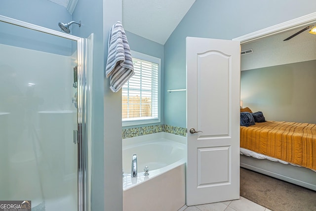 bathroom with ceiling fan, tile patterned flooring, a textured ceiling, vaulted ceiling, and shower with separate bathtub