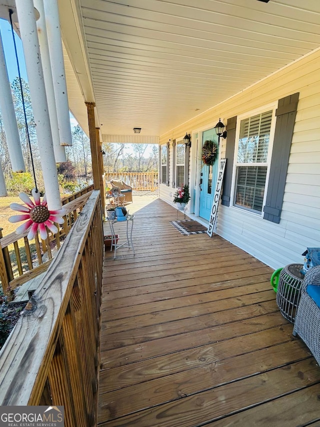 wooden deck with a porch