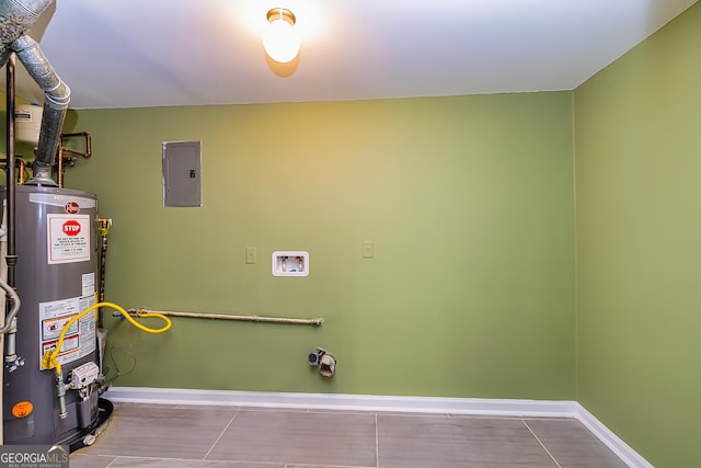 laundry room featuring washer hookup, electric panel, gas water heater, and tile patterned flooring