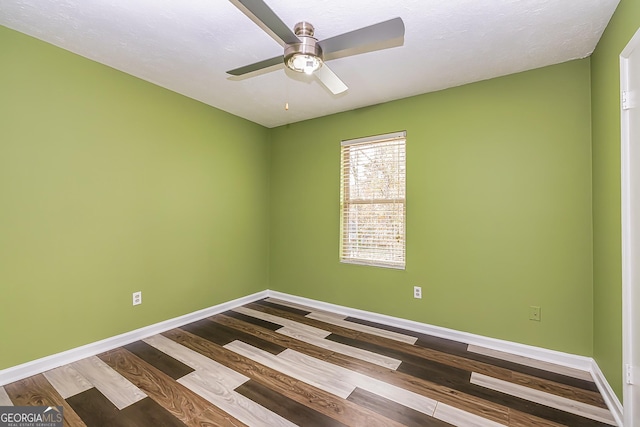 unfurnished room featuring ceiling fan and wood-type flooring