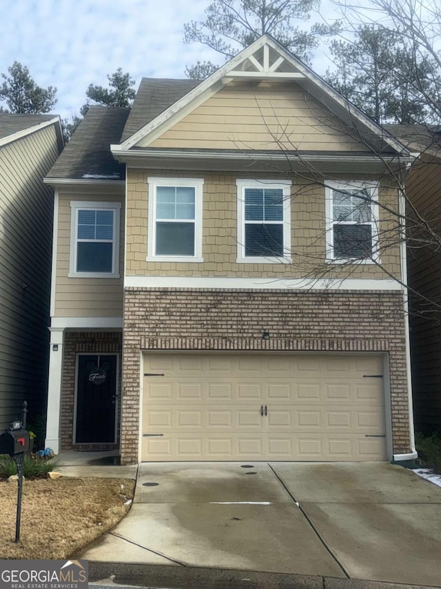 view of front of property featuring a garage